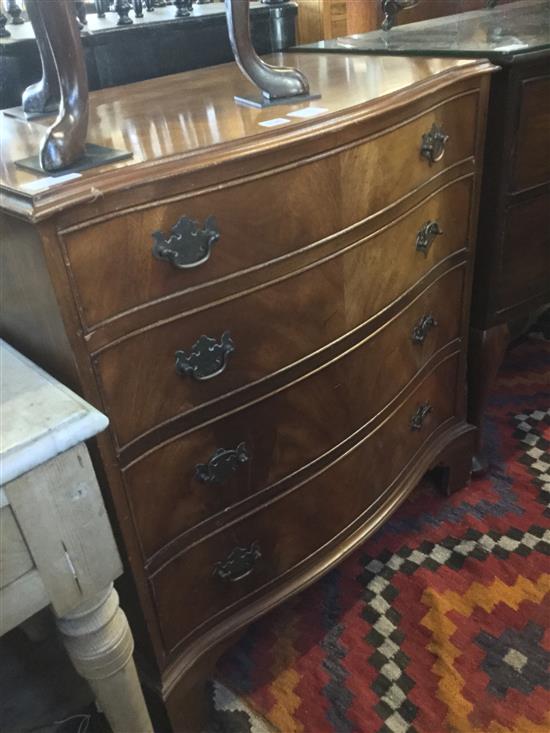 Reproduction mahogany serpentine chest of drawers(-)